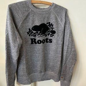 Like new , Roots sweatshirt in size M .